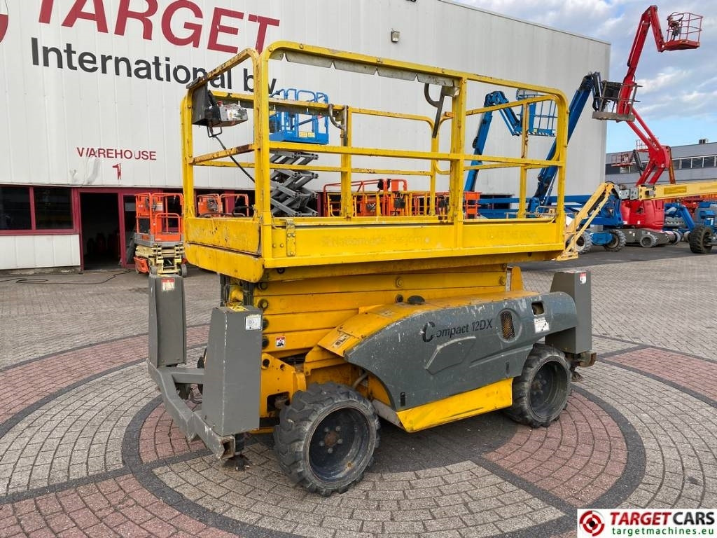Haulotte Compact 12DX Diesel 4x4 Scissor Work Lift 1206cm - Plataforma de Tijera/ Plataforma de tesoura: foto 1 Haulotte Compact 12DX Diesel 4x4 Scissor Work Lift 1206cm - Plataforma de Tijera/ Plataforma de tesoura: foto 1