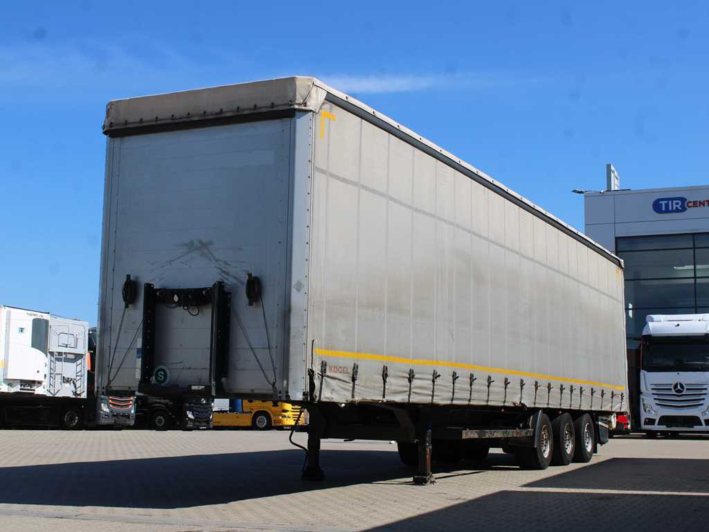 Kögel SN 24 MEGA, SAF, LOWDECK, LIFT AXLE, LIFTING ROOF, MULTILOCK - Semi-reboque de lona: foto 1 Kögel SN 24 MEGA, SAF, LOWDECK, LIFT AXLE, LIFTING ROOF, MULTILOCK - Semi-reboque de lona: foto 1