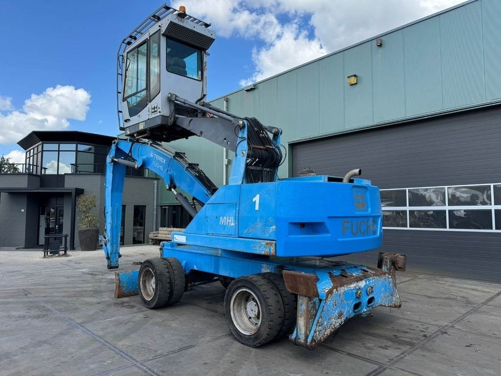 Fuchs MHL 320 - Manipulador de material: foto 3 Fuchs MHL 320 - Manipulador de material: foto 3