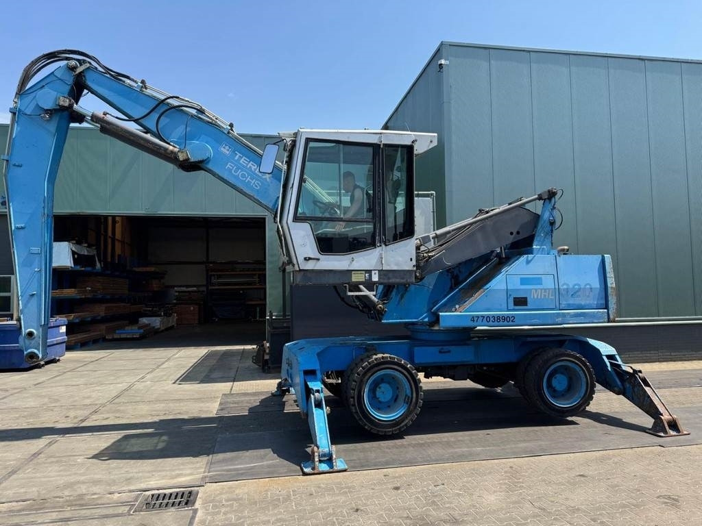 Fuchs MHL 320 - Manipulador de material: foto 2 Fuchs MHL 320 - Manipulador de material: foto 2