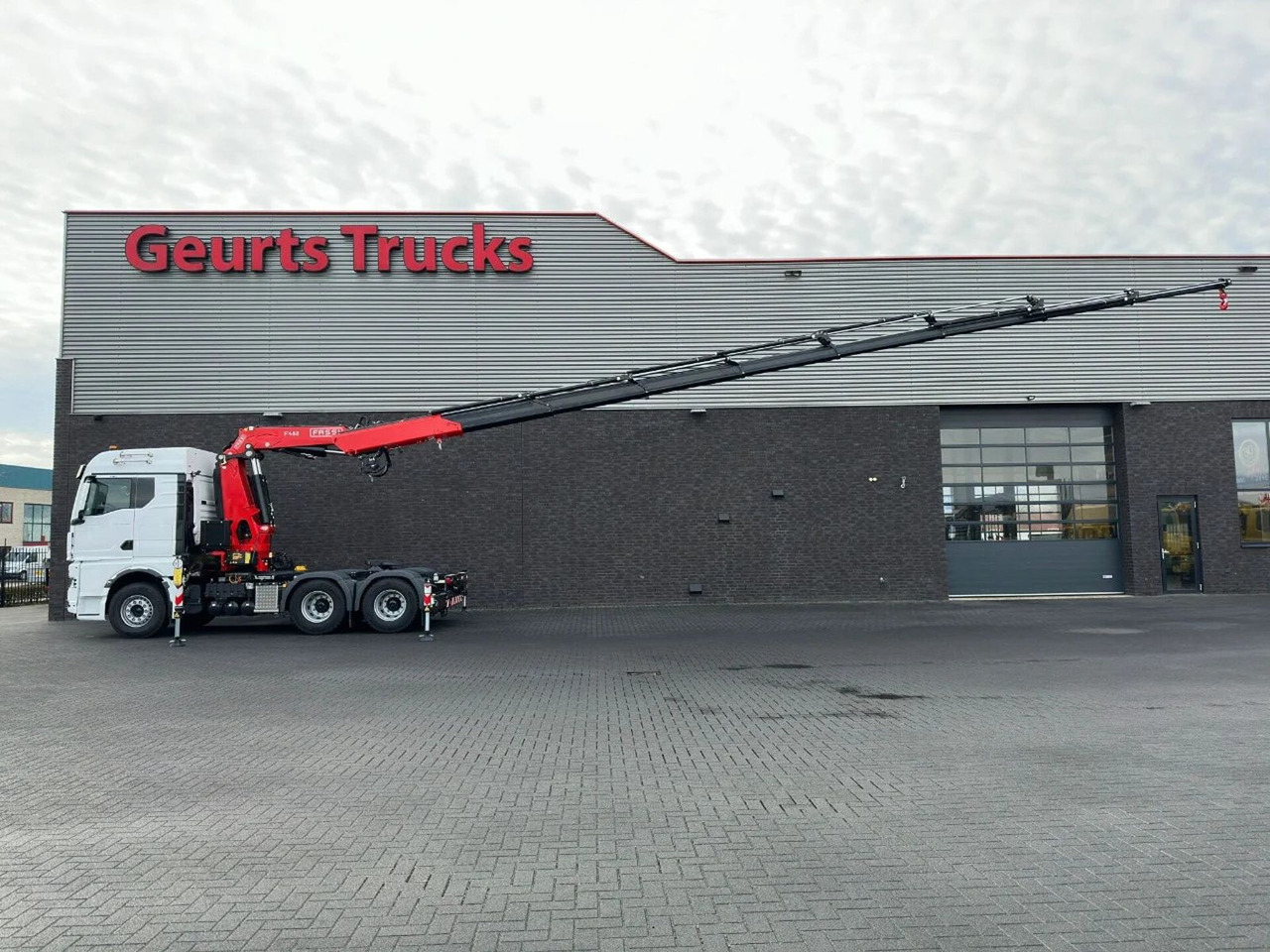 MAN TGX 33.520 6X4 TREKKER-BAKWAGEN COMBI + FASSI F4 - Camião grua: foto 4 MAN TGX 33.520 6X4 TREKKER-BAKWAGEN COMBI + FASSI F4 - Camião grua: foto 4