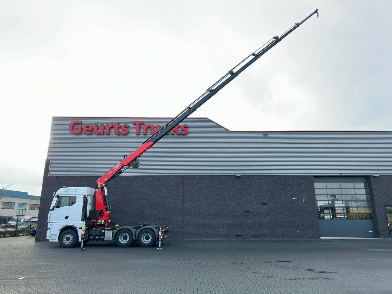 MAN TGX 33.520 6X4 TREKKER-BAKWAGEN COMBI + FASSI F4 - Camião grua: foto 5 MAN TGX 33.520 6X4 TREKKER-BAKWAGEN COMBI + FASSI F4 - Camião grua: foto 5
