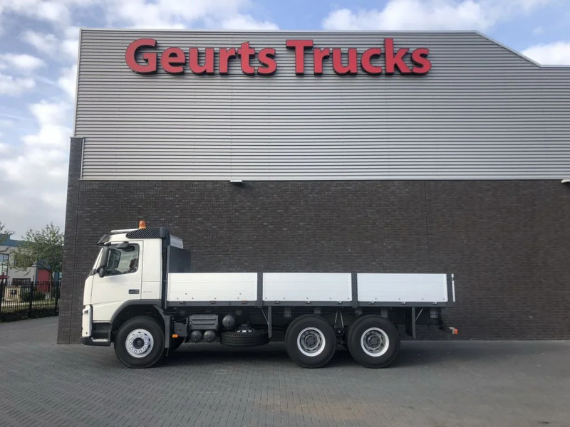 Volvo FM 370 6X4 CARGO TRUCK RHD UNUSED - Camião de caixa aberta/ Plataforma: foto 1 Volvo FM 370 6X4 CARGO TRUCK RHD UNUSED - Camião de caixa aberta/ Plataforma: foto 1
