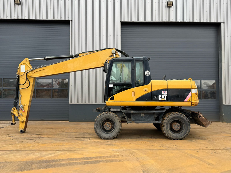 Caterpillar M315D - Escavadeira de rodas: foto 1 Caterpillar M315D - Escavadeira de rodas: foto 1