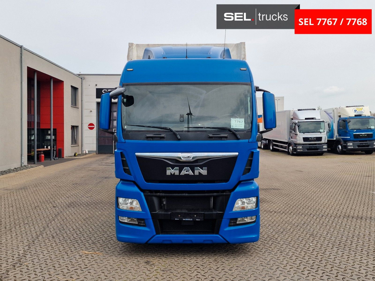 MAN TGX 18.440 4X2 LL-U /Intarder/Hubdach/Durchlade - Camião de lona: foto 2 MAN TGX 18.440 4X2 LL-U /Intarder/Hubdach/Durchlade - Camião de lona: foto 2