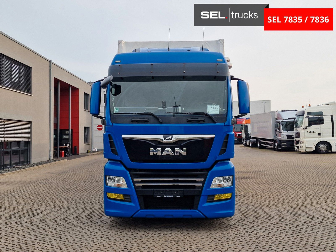 MAN TGX 18.500 4x2 LL-U/ Intarder/Durchlade/Hubdach - Camião de lona: foto 2 MAN TGX 18.500 4x2 LL-U/ Intarder/Durchlade/Hubdach - Camião de lona: foto 2