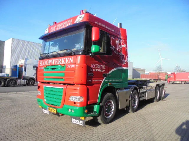 DAF XF 105 410 FAD 8X4 STEEL SUSPENSION - Camião polibenne: foto 1 DAF XF 105 410 FAD 8X4 STEEL SUSPENSION - Camião polibenne: foto 1