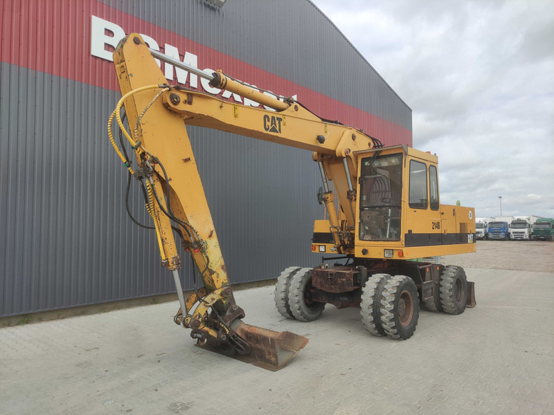 Caterpillar 214 B wheel excavator - Escavadeira de rodas: foto 2 Caterpillar 214 B wheel excavator - Escavadeira de rodas: foto 2