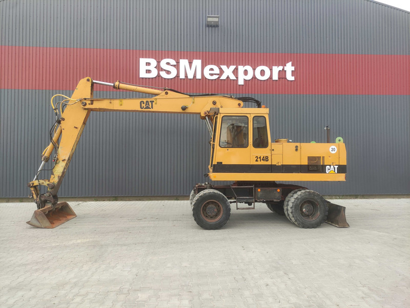 Caterpillar 214 B wheel excavator - Escavadeira de rodas: foto 1 Caterpillar 214 B wheel excavator - Escavadeira de rodas: foto 1