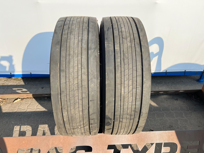 Bridgestone Bridgestone 315/70R22.5 Enliten Steer 154/150 M+S 3PMSF gebruikte set - Pneu para Camião: foto 1 Bridgestone Bridgestone 315/70R22.5 Enliten Steer 154/150 M+S 3PMSF gebruikte set - Pneu para Camião: foto 1