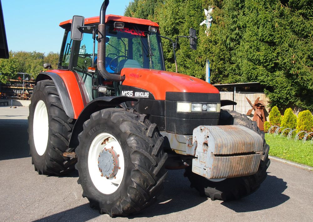 Ciągnik New Holland NH M 135 1998 NEW HOLLAND TM M135 - Trator: foto 1 Ciągnik New Holland NH M 135 1998 NEW HOLLAND TM M135 - Trator: foto 1