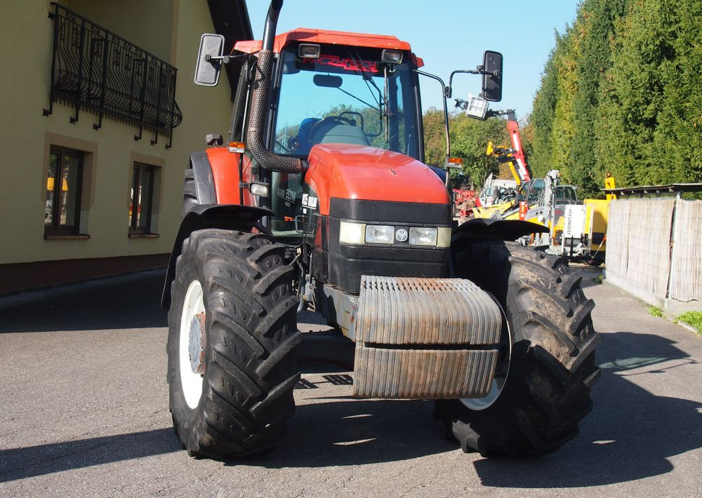 Ciągnik New Holland NH M 135 1998 NEW HOLLAND TM M135 - Trator: foto 4 Ciągnik New Holland NH M 135 1998 NEW HOLLAND TM M135 - Trator: foto 4