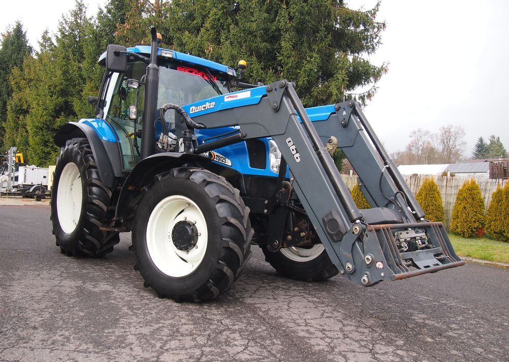 Ciągnik New Holland NH TS125A 6 cylindrów 2004 Ciągnik rolniczy New Holland TS125A - Trator: foto 2 Ciągnik New Holland NH TS125A 6 cylindrów 2004 Ciągnik rolniczy New Holland TS125A - Trator: foto 2