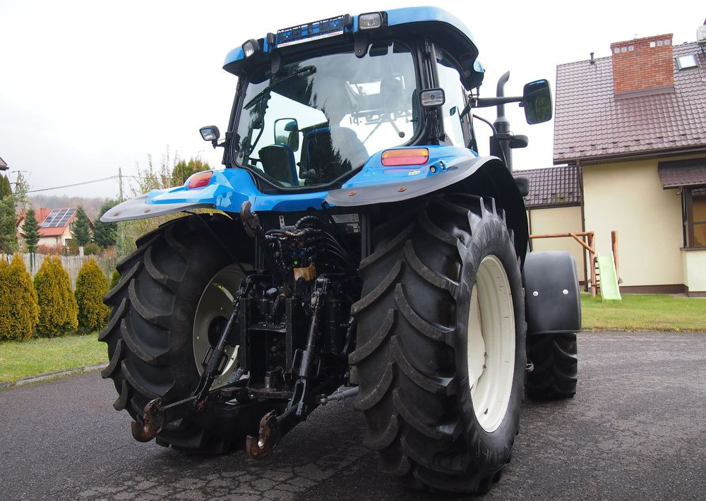 Ciągnik New Holland NH TS125A 6 cylindrów 2004 Ciągnik rolniczy New Holland TS125A - Trator: foto 5 Ciągnik New Holland NH TS125A 6 cylindrów 2004 Ciągnik rolniczy New Holland TS125A - Trator: foto 5