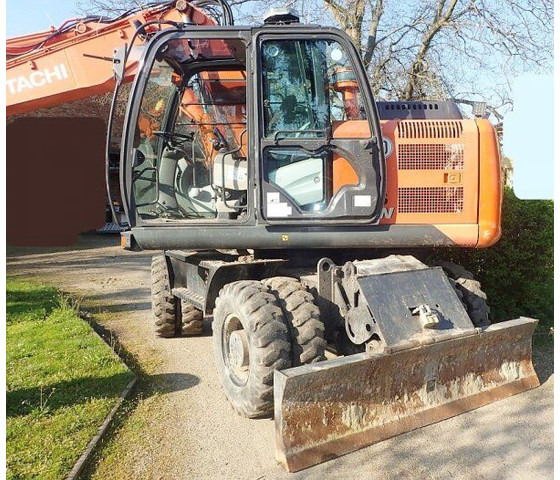 Hitachi Zaxis 140W-5B - Escavadeira de rodas: foto 2 Hitachi Zaxis 140W-5B - Escavadeira de rodas: foto 2
