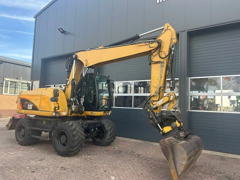 Caterpillar M313D - Escavadeira de rodas: foto 3 Caterpillar M313D - Escavadeira de rodas: foto 3