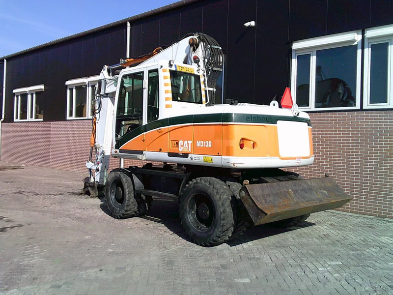 Caterpillar M313D - Escavadeira de rodas: foto 2 Caterpillar M313D - Escavadeira de rodas: foto 2