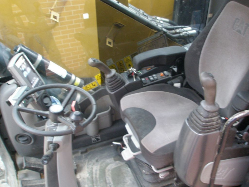 Escavadeira de rodas Caterpillar M318D: foto 7