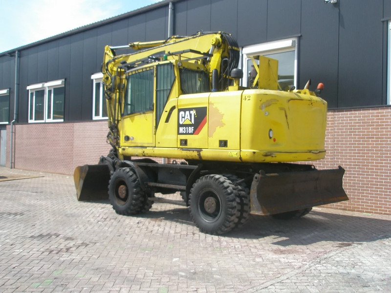 Caterpillar M318F - Escavadeira de rodas: foto 2 Caterpillar M318F - Escavadeira de rodas: foto 2