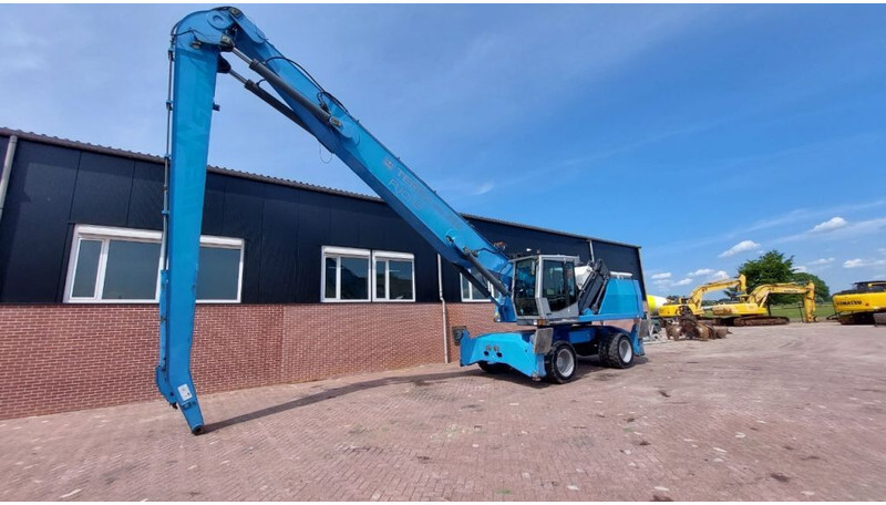 Fuchs MHL360 - Manipulador de material: foto 1 Fuchs MHL360 - Manipulador de material: foto 1