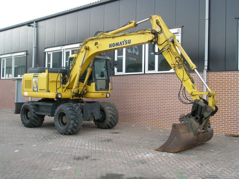 Komatsu PW140-7 - Escavadeira de rodas: foto 3 Komatsu PW140-7 - Escavadeira de rodas: foto 3