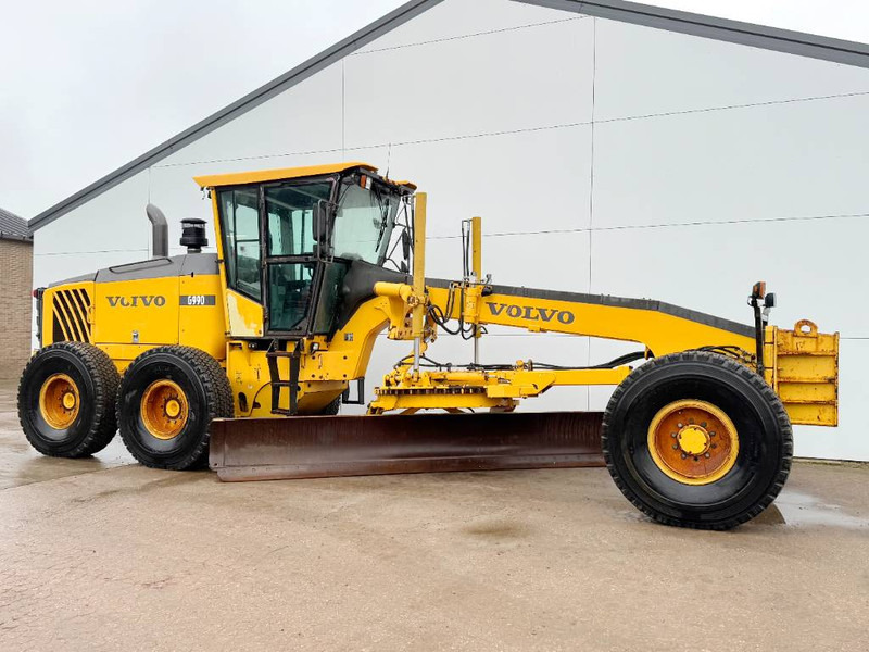 Volvo G990 - 4.85m Blade / Pushblock / Airco - Motoniveladora: foto 5 Volvo G990 - 4.85m Blade / Pushblock / Airco - Motoniveladora: foto 5