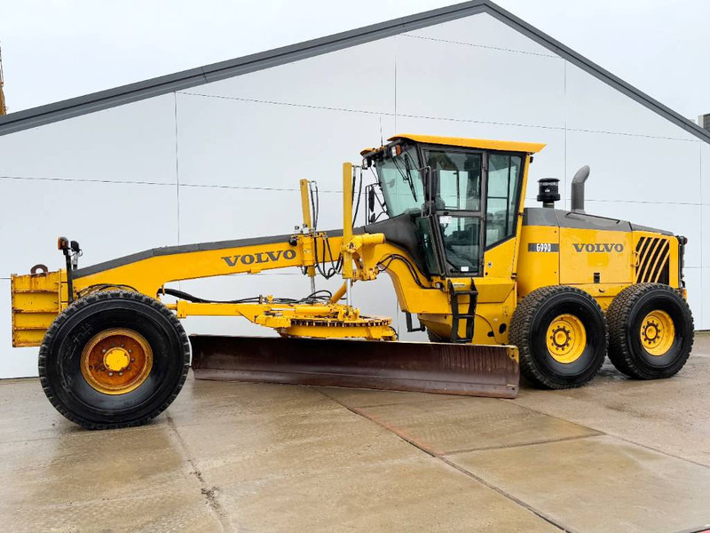 Volvo G990 - 4.85m Blade / Pushblock / Airco - Motoniveladora: foto 1 Volvo G990 - 4.85m Blade / Pushblock / Airco - Motoniveladora: foto 1
