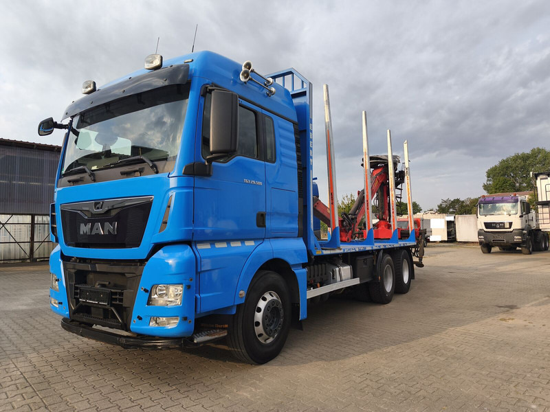 MAN TGX 26.500 Holz-LKW Euro6 6x4 Holztransporter m Palfinger (16) - Camião de transporte de madeira, Camião grua: foto 1 MAN TGX 26.500 Holz-LKW Euro6 6x4 Holztransporter m Palfinger (16) - Camião de transporte de madeira, Camião grua: foto 1