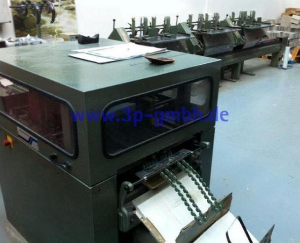 Muller Martini 1509 Saddle Stitcher - Máquina de impressão: foto 1 Muller Martini 1509 Saddle Stitcher - Máquina de impressão: foto 1