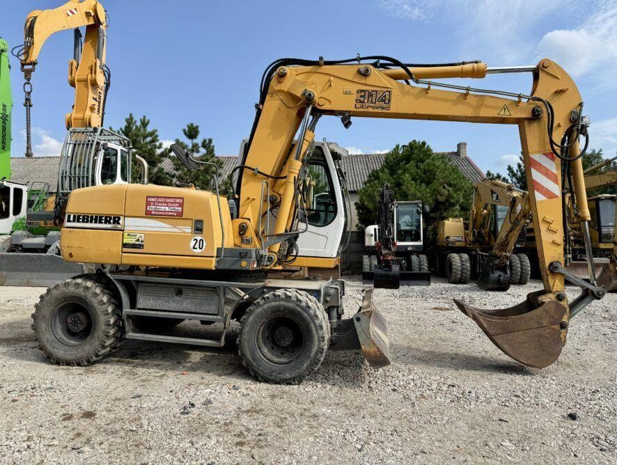 Liebherr A314 - Escavadeira de rodas: foto 4 Liebherr A314 - Escavadeira de rodas: foto 4