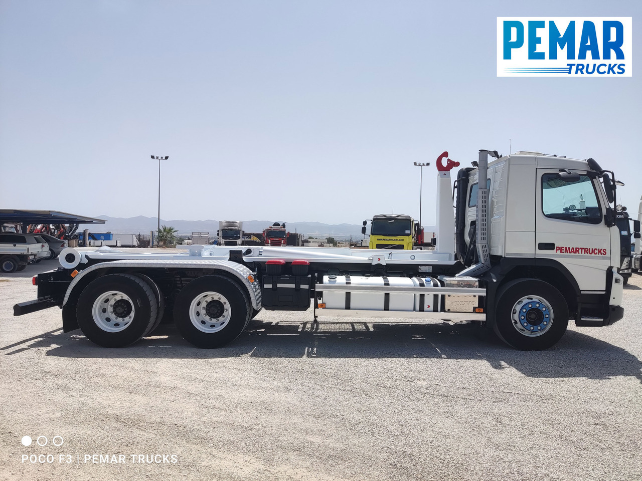 VOLVO FMX 410 6X4 MULTILIFT 21T EURO 5 - Camião transportador de contêineres/ Caixa móvel: foto 5 VOLVO FMX 410 6X4 MULTILIFT 21T EURO 5 - Camião transportador de contêineres/ Caixa móvel: foto 5