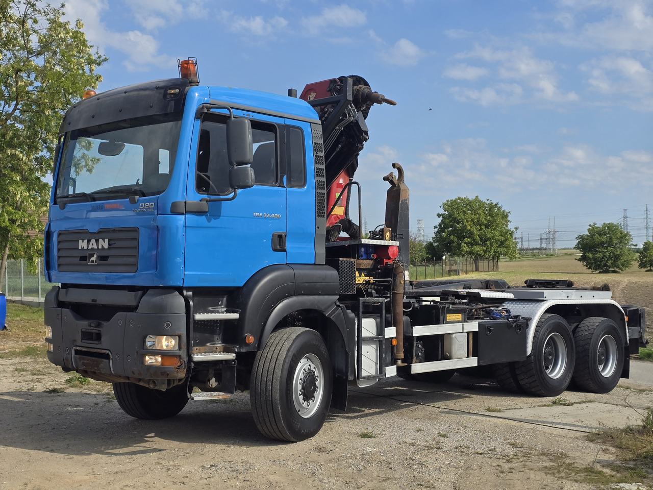 MAN TGA 33.430 6X6 / HMF 1823 K3+REM.CON./ HOOK SYSTEM 2x in stock - Camião polibenne, Camião grua: foto 3 MAN TGA 33.430 6X6 / HMF 1823 K3+REM.CON./ HOOK SYSTEM 2x in stock - Camião polibenne, Camião grua: foto 3