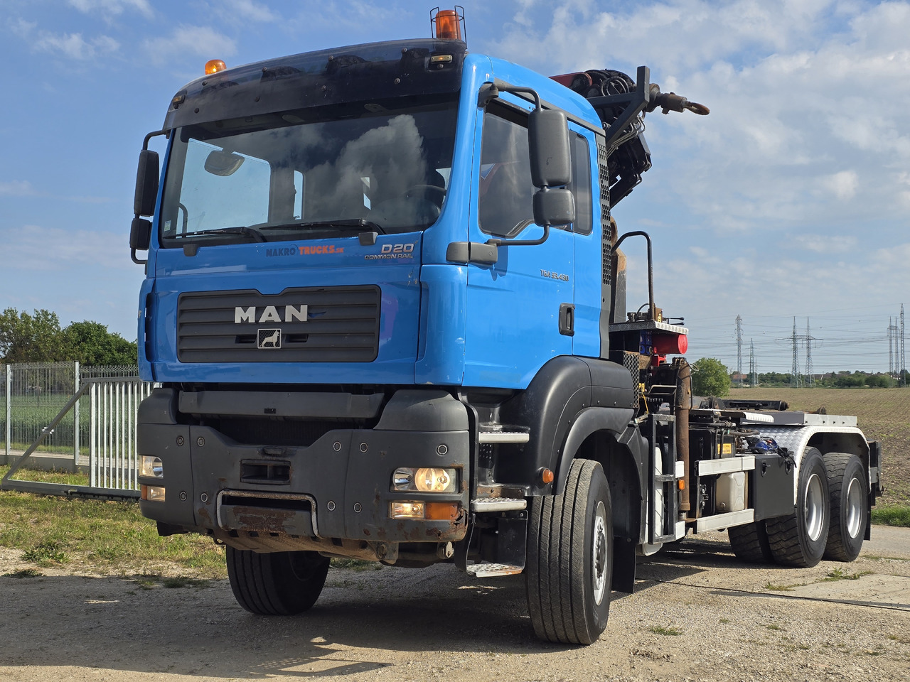 MAN TGA 33.430 6X6 / HMF 1823 K3+REM.CON./ HOOK SYSTEM - Camião polibenne, Camião grua: foto 2 MAN TGA 33.430 6X6 / HMF 1823 K3+REM.CON./ HOOK SYSTEM - Camião polibenne, Camião grua: foto 2