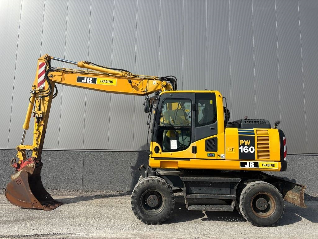 Komatsu PW 160 - Escavadeira de rodas: foto 1 Komatsu PW 160 - Escavadeira de rodas: foto 1