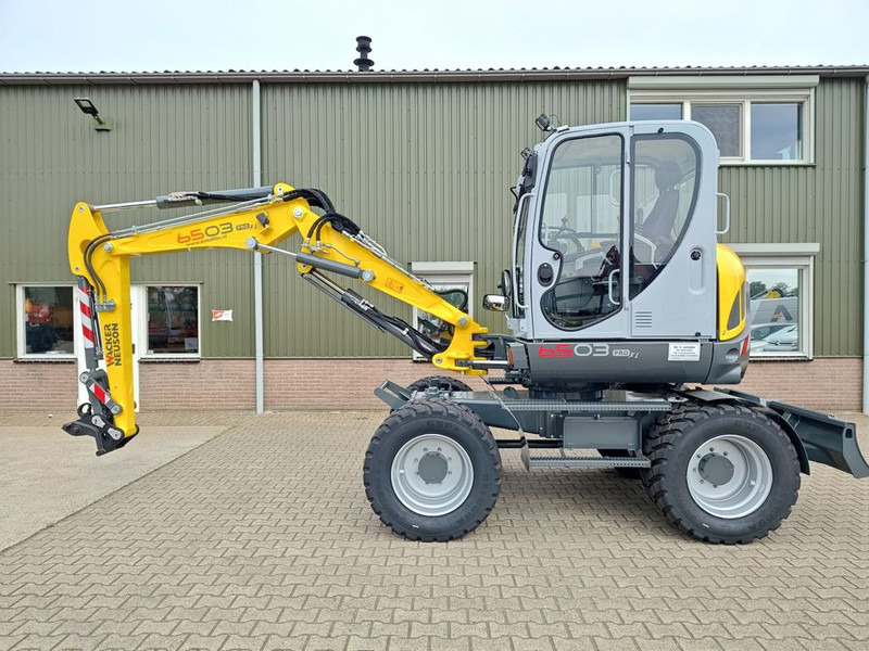 WACKER NEUSON 6503-2 - Escavadeira de rodas: foto 1 WACKER NEUSON 6503-2 - Escavadeira de rodas: foto 1