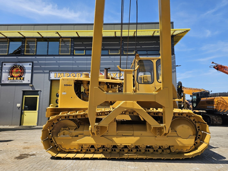 Caterpillar 594H - Colocar tubos: foto 1 Caterpillar 594H - Colocar tubos: foto 1