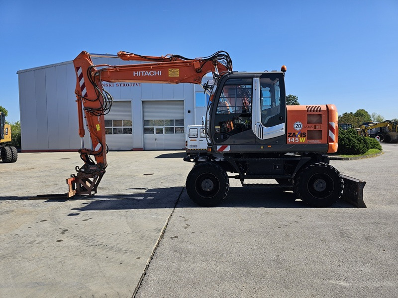HITACHI ZX145W-3 - Escavadeira de rodas: foto 1 HITACHI ZX145W-3 - Escavadeira de rodas: foto 1