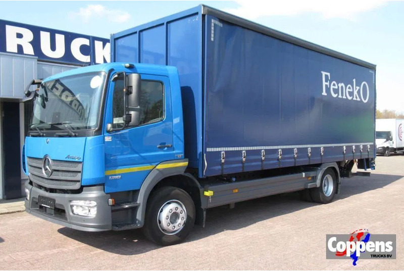 Mercedes-Benz Atego 1318L Euro 6 - Camião de lona: foto 1 Mercedes-Benz Atego 1318L Euro 6 - Camião de lona: foto 1