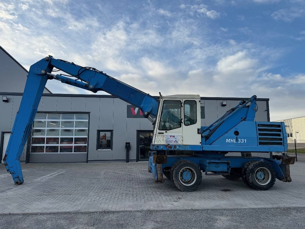 Fuchs MHL 331 - Manipulador de material: foto 2 Fuchs MHL 331 - Manipulador de material: foto 2