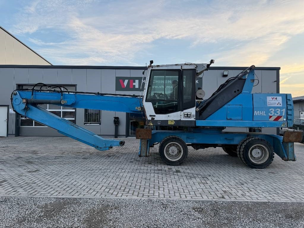 Fuchs MHL 331 - Manipulador de material: foto 2 Fuchs MHL 331 - Manipulador de material: foto 2