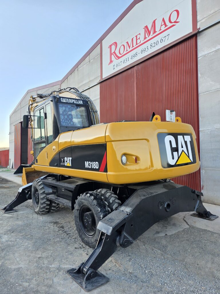 CAT M318D - Escavadeira de rodas: foto 2 CAT M318D - Escavadeira de rodas: foto 2