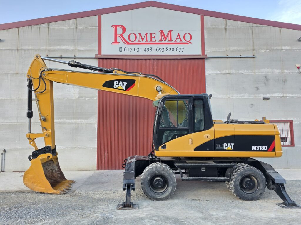 CAT M318D - Escavadeira de rodas: foto 1 CAT M318D - Escavadeira de rodas: foto 1