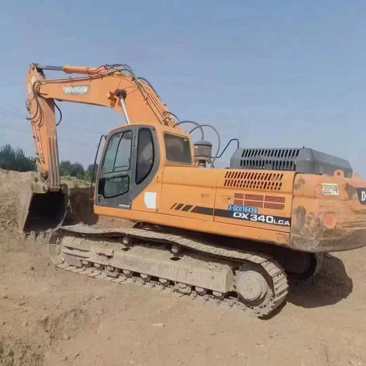 Used Original Korea Doosan 34 Ton Excavator with Cheap Price and Good Condition DOOSAN Dx340LCA Dx225 Dx330 DX360for Sale - Escavadora de rastos: foto 1 Used Original Korea Doosan 34 Ton Excavator with Cheap Price and Good Condition DOOSAN Dx340LCA Dx225 Dx330 DX360for Sale - Escavadora de rastos: foto 1