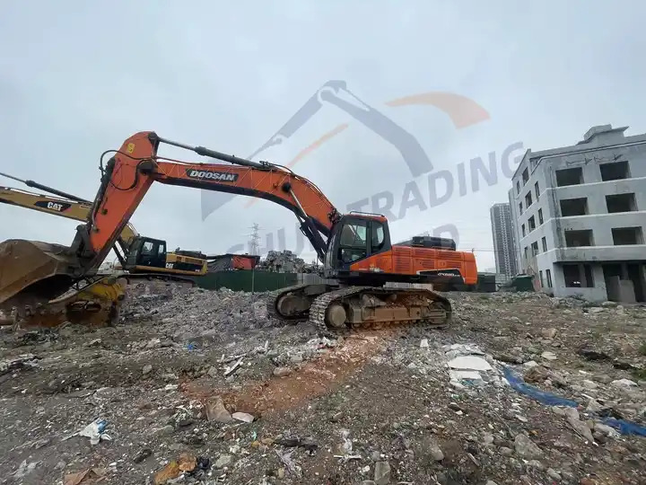 High quality Used Doosan excavator DX520LC-9C in good condition for sale - Escavadora de rastos: foto 4 High quality Used Doosan excavator DX520LC-9C in good condition for sale - Escavadora de rastos: foto 4