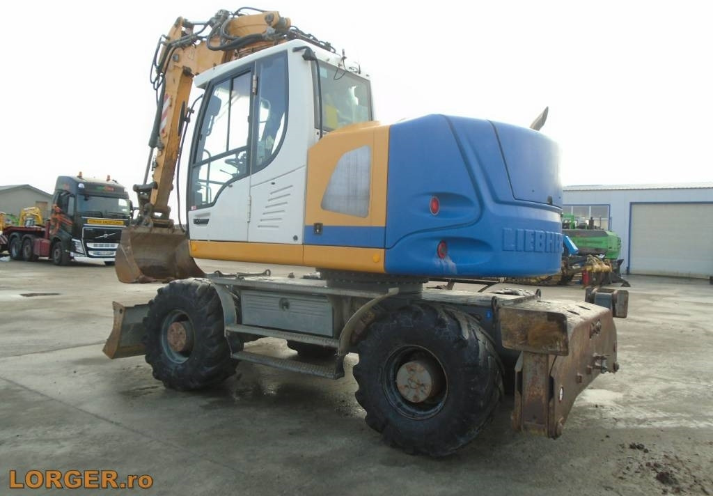Liebherr A 914 Compact - Escavadeira de rodas: foto 2 Liebherr A 914 Compact - Escavadeira de rodas: foto 2