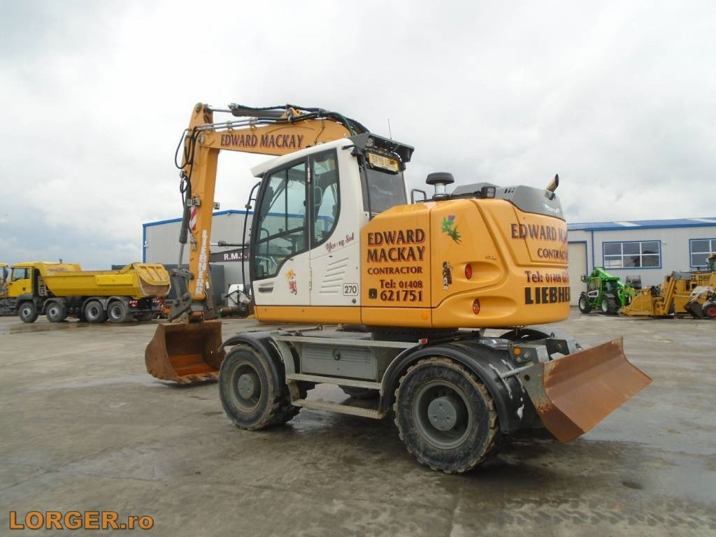 Liebherr A 914 - Escavadeira de rodas: foto 3 Liebherr A 914 - Escavadeira de rodas: foto 3