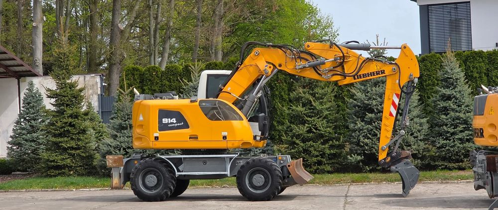 Liebherr A 914 COMPACT - Escavadeira de rodas: foto 1 Liebherr A 914 COMPACT - Escavadeira de rodas: foto 1