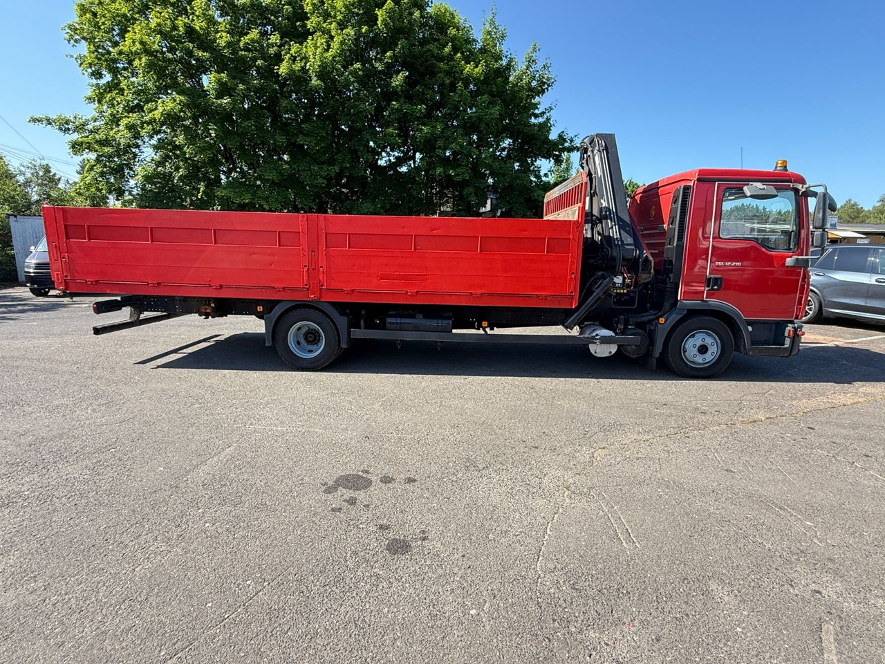 MAN TGL 12.210 mit Kran - Camião de caixa aberta/ Plataforma, Camião grua: foto 5 MAN TGL 12.210 mit Kran - Camião de caixa aberta/ Plataforma, Camião grua: foto 5