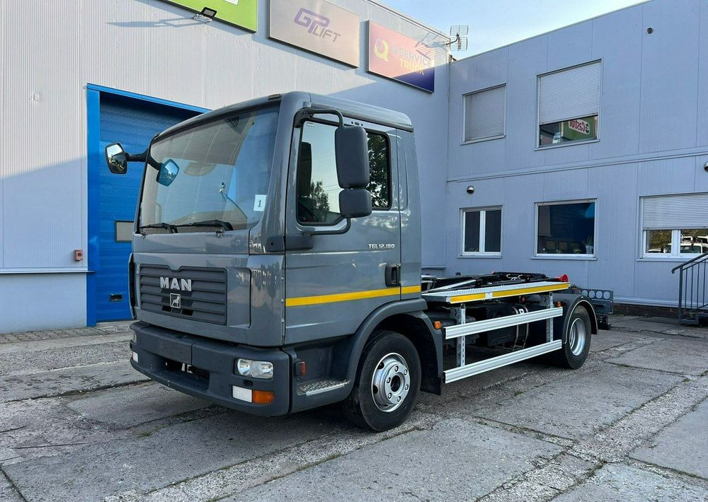 MAN TGL 12.180, hakowiec Janco/GP Lift - Caminhão de lixo: foto 1 MAN TGL 12.180, hakowiec Janco/GP Lift - Caminhão de lixo: foto 1