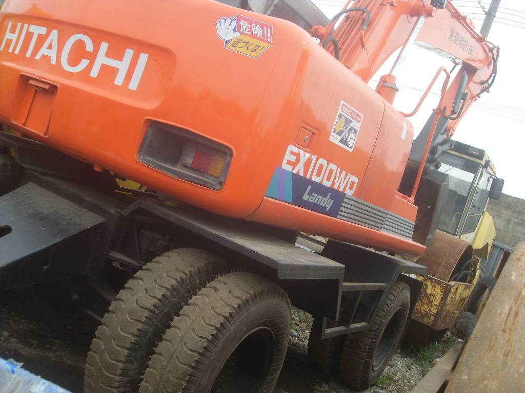 Hitachi EX100WD-3 - Escavadeira de rodas: foto 1 Hitachi EX100WD-3 - Escavadeira de rodas: foto 1
